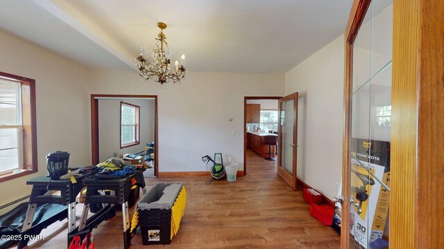 109 Lake Dr, Dingmans Ferry, PA 18328 - dining room with a chandelier and wood finished floors