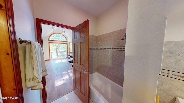 109 Lake Dr, Dingmans Ferry, PA 18328 - full bathroom featuring bathtub / shower combination and tile walls