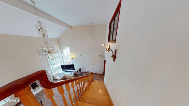 109 Lake Dr, Dingmans Ferry, PA 18328 - stairway with a chandelier and wood finished floors