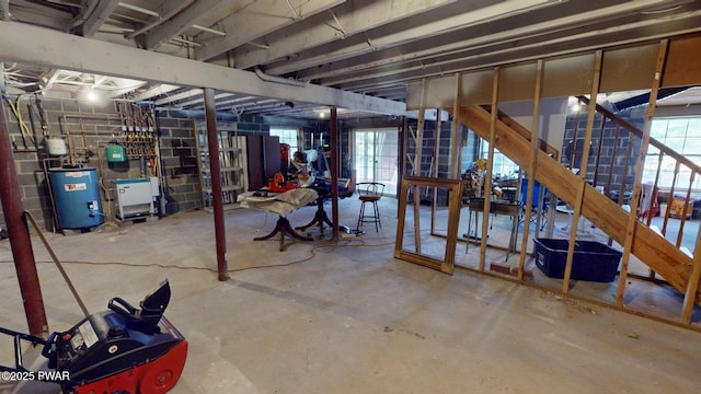 109 Lake Dr, Dingmans Ferry, PA 18328 - below grade area featuring water heater and plenty of natural light