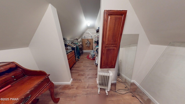109 Lake Dr, Dingmans Ferry, PA 18328 - interior space with vaulted ceiling and light wood-type flooring