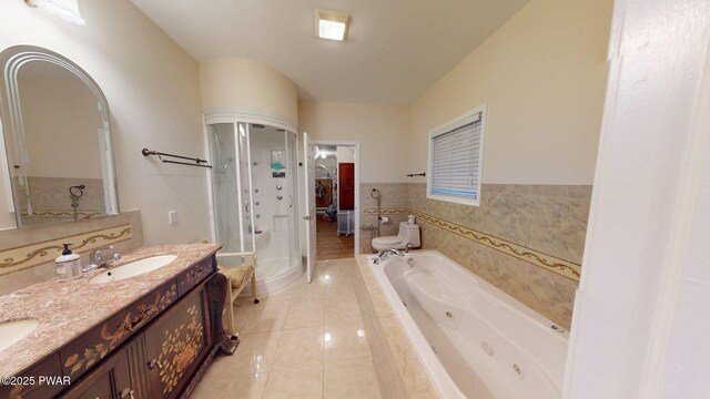 109 Lake Dr, Dingmans Ferry, PA 18328 - bathroom featuring a stall shower, a tub with jets, double vanity, and tile patterned floors