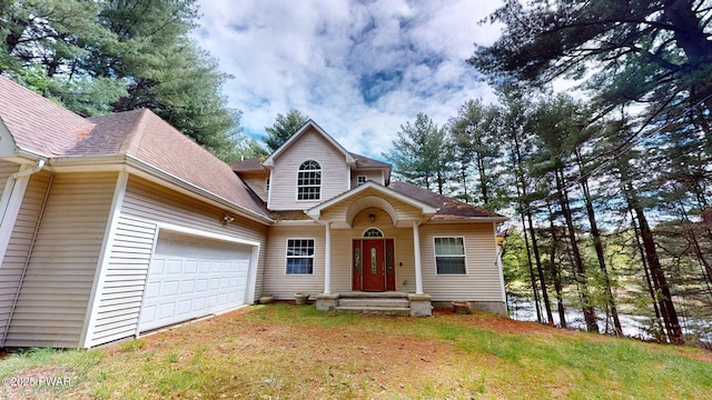 109 Lake Dr, Dingmans Ferry, PA 18328 - view of front of home featuring a garage and a shingled roof