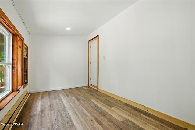 36 Rolling Acres Rd, Lake Ariel, PA 18436 - empty room with a baseboard heating unit, light wood-style floors, and recessed lighting
