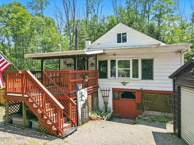 36 Rolling Acres Rd, Lake Ariel, PA 18436 - view of front facade with stairs and a wooden deck