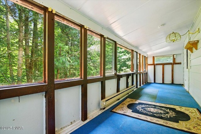 36 Rolling Acres Rd, Lake Ariel, PA 18436 - unfurnished sunroom with carpet, baseboard heating, and vaulted ceiling