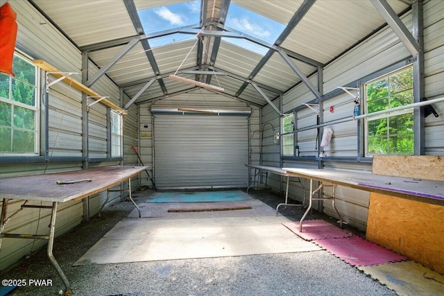36 Rolling Acres Rd, Lake Ariel, PA 18436 - garage featuring metal wall and a workshop area