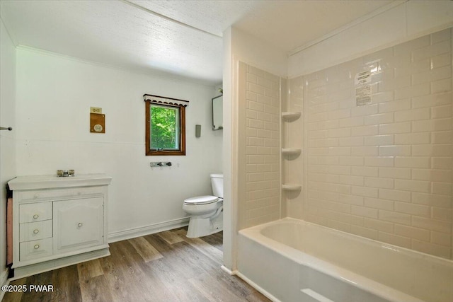 36 Rolling Acres Rd, Lake Ariel, PA 18436 - full bath with wood finished floors, vanity, bathtub / shower combination, ornamental molding, and a textured ceiling
