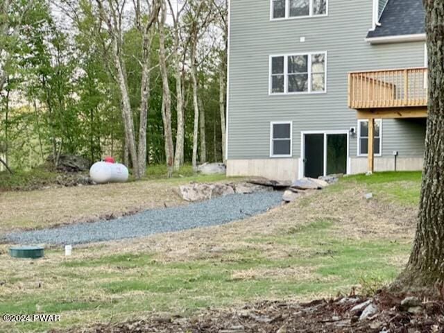 view of yard with a deck