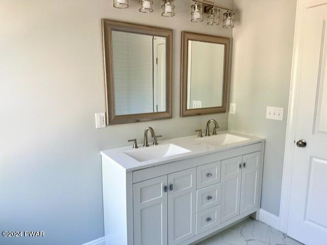 bathroom featuring vanity