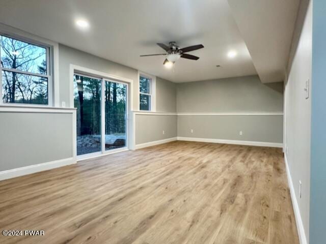 empty room featuring light hardwood / wood-style floors and ceiling fan