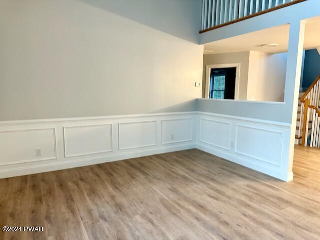 unfurnished room featuring light hardwood / wood-style floors