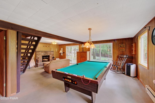 111 Blueridge Ln, Lords Valley, PA 18428 - rec room with wooden walls, a baseboard radiator, billiards table, and a fireplace