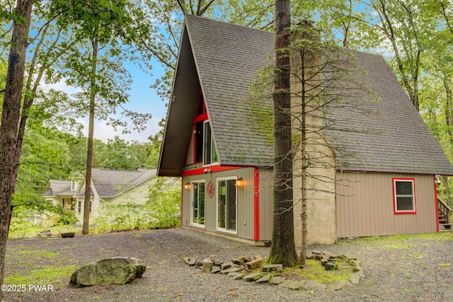 111 Blueridge Ln, Lords Valley, PA 18428 - view of property exterior with roof with shingles and a chimney