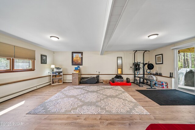 414 Leisure Loop, Milford, PA 18337 - exercise room with wood finished floors and a baseboard heating unit