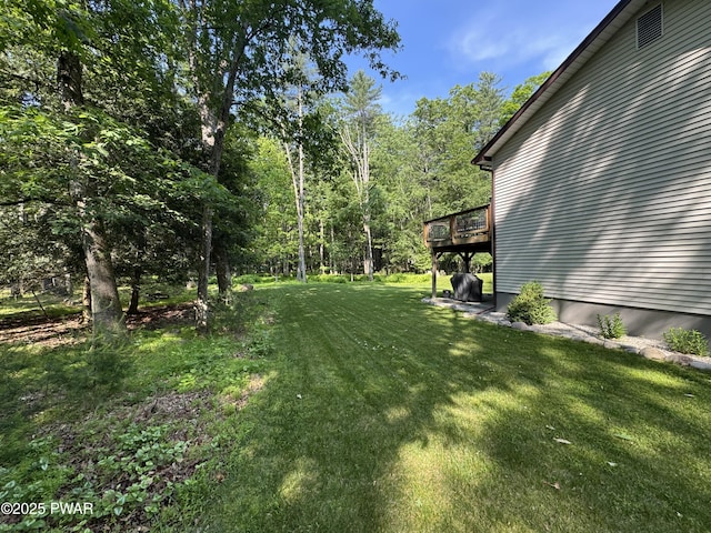 414 Leisure Loop, Milford, PA 18337 - view of green lawn with a deck