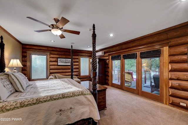 carpeted bedroom with log walls, recessed lighting, a wall mounted air conditioner, and access to exterior