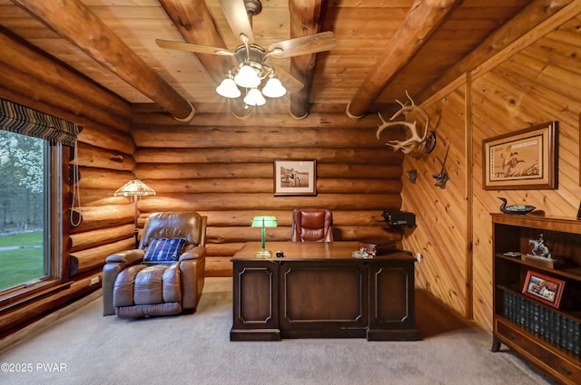 office space with wooden ceiling, ceiling fan, carpet, and beam ceiling