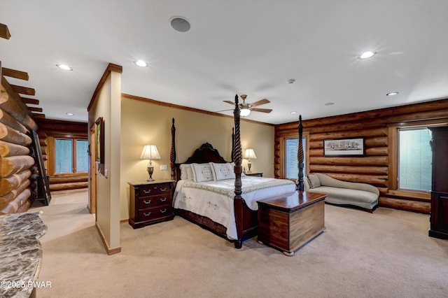 bedroom with light colored carpet, recessed lighting, and rustic walls