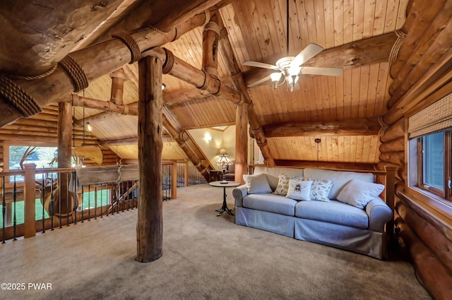 interior space with ceiling fan, wooden ceiling, rustic walls, vaulted ceiling with beams, and carpet flooring
