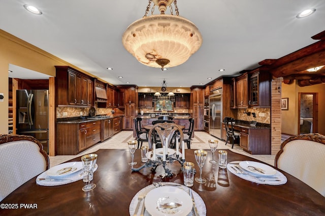 dining room with recessed lighting
