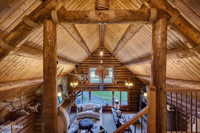 living room with an inviting chandelier, vaulted ceiling with beams, log walls, and wooden ceiling