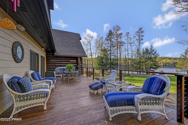 wooden deck featuring outdoor dining space