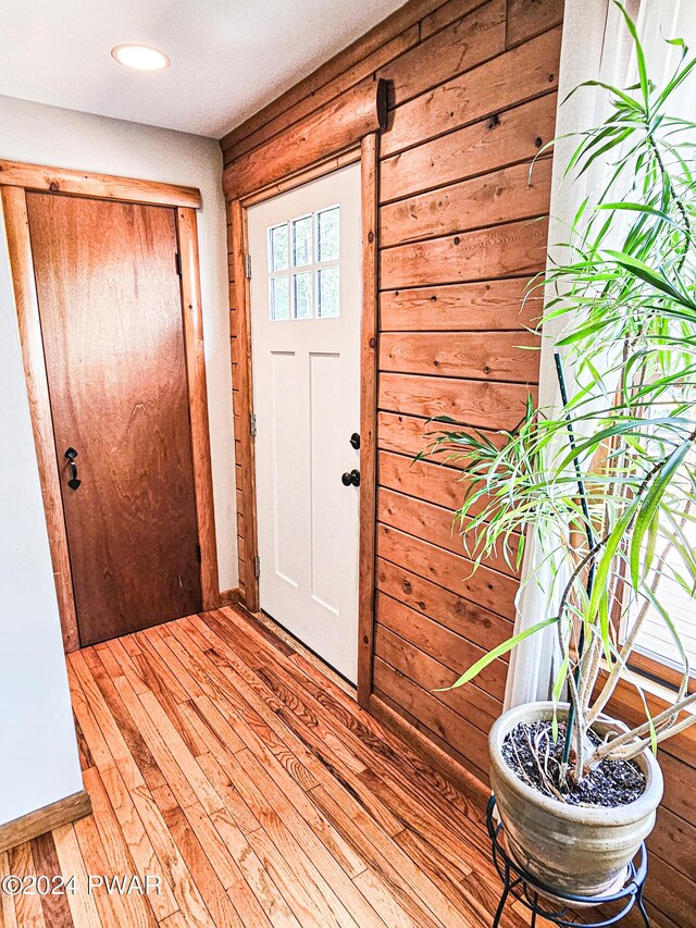 foyer entrance with light wood-type flooring