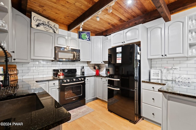 kitchen featuring beam ceiling, white cabinetry, light hardwood / wood-style floors, black appliances, and wood ceiling