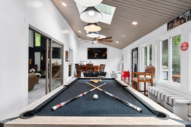 game room featuring lofted ceiling with skylight, ceiling fan, wooden ceiling, and pool table