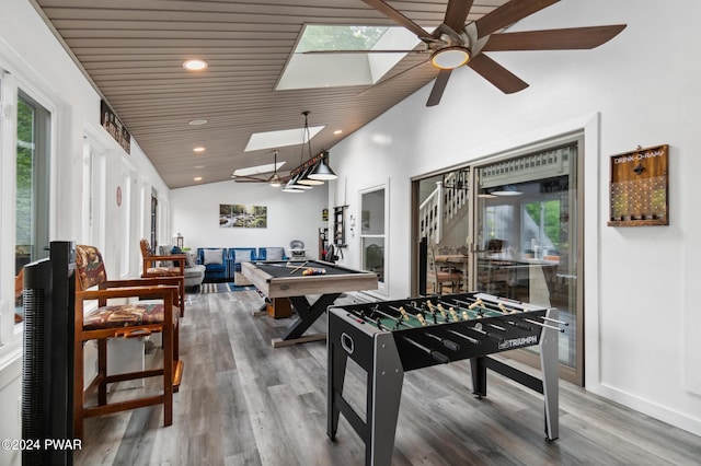 playroom with a skylight, wood ceiling, ceiling fan, wood-type flooring, and billiards