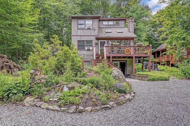 view of front of property featuring a deck