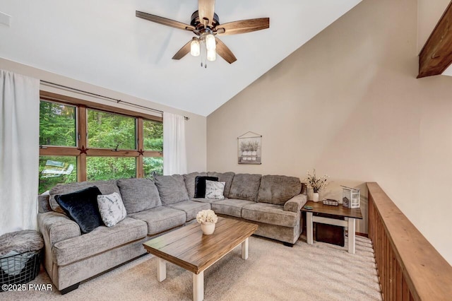 carpeted living room featuring lofted ceiling and ceiling fan