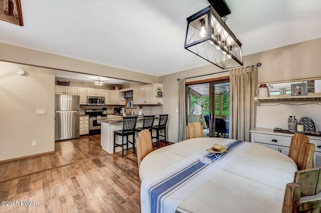 dining area featuring light hardwood / wood-style flooring