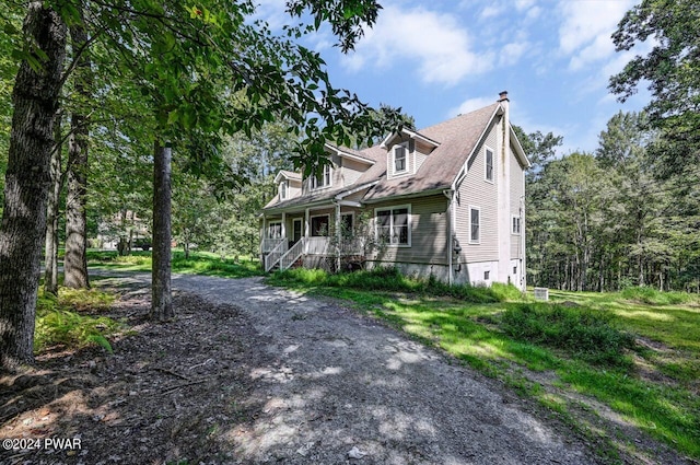 view of new england style home