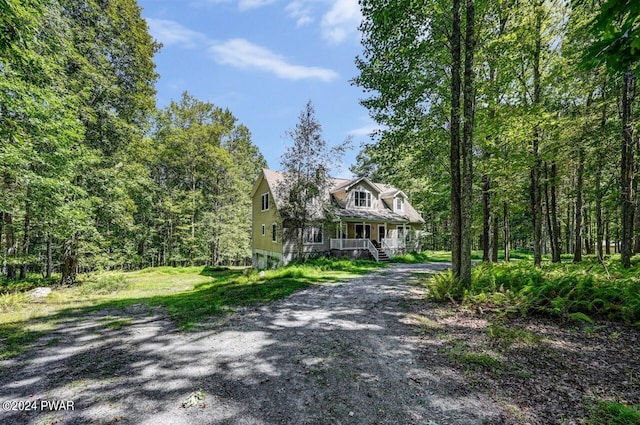 cape cod house with a porch