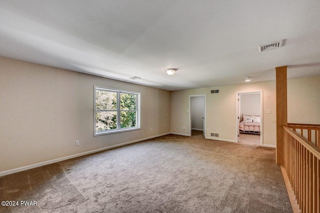 spare room with carpet floors