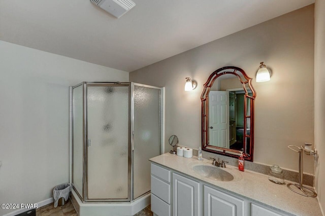 bathroom featuring vanity and walk in shower