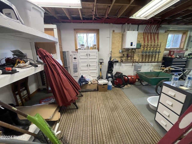 storage area featuring tankless water heater