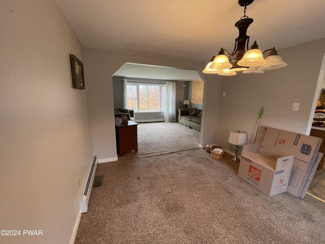 unfurnished dining area with carpet and a chandelier