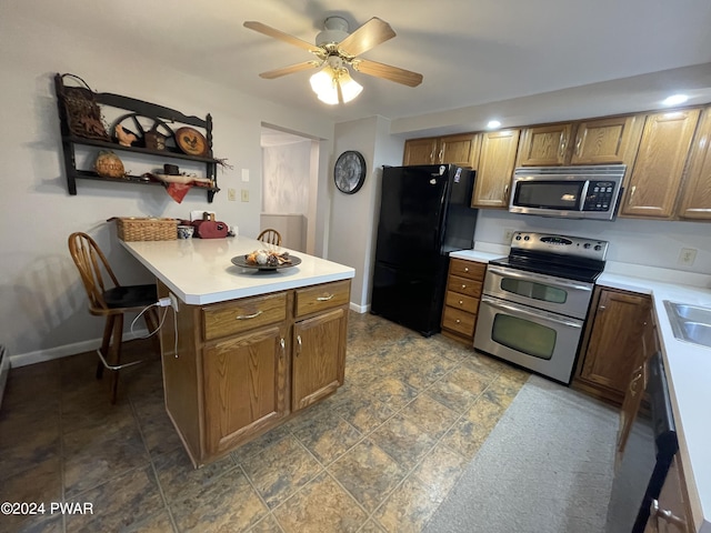 kitchen with ceiling fan, sink, and appliances with stainless steel finishes