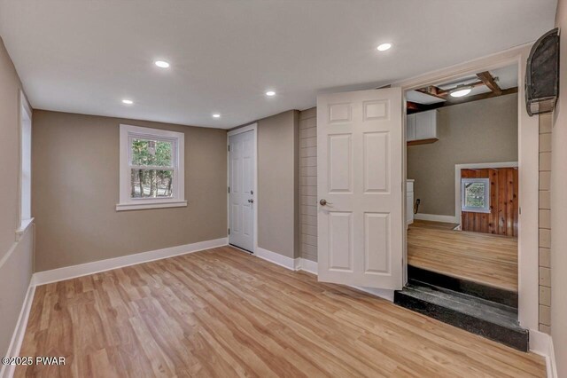 110 Maple Dr, Greentown, PA 18426 - below grade area with a wealth of natural light, wood finished floors, recessed lighting, and baseboards