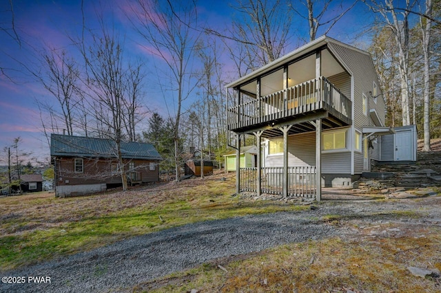 110 Maple Dr, Greentown, PA 18426 - view of front of house with a deck, an outdoor structure, and a storage shed