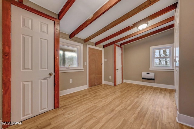 110 Maple Dr, Greentown, PA 18426 - additional living space featuring baseboards, vaulted ceiling with beams, heating unit, and light wood-style flooring