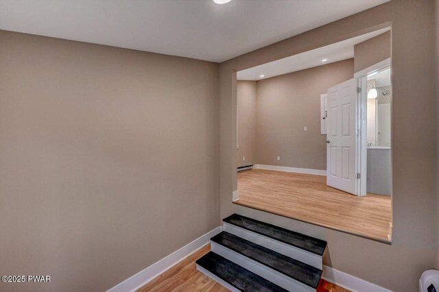 110 Maple Dr, Greentown, PA 18426 - stairway with baseboards, recessed lighting, wood finished floors, and baseboard heating