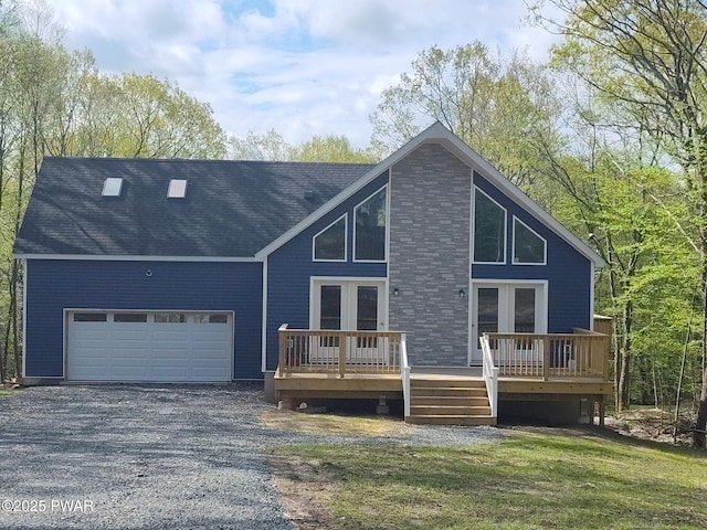 4409 Middleton Dr, Milford, PA 18337 - rear view of house with a deck, an attached garage, and gravel driveway