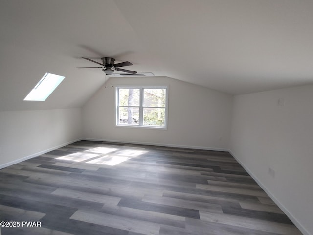 4409 Middleton Dr, Milford, PA 18337 - additional living space with a ceiling fan, a skylight, baseboards, wood finished floors, and lofted ceiling