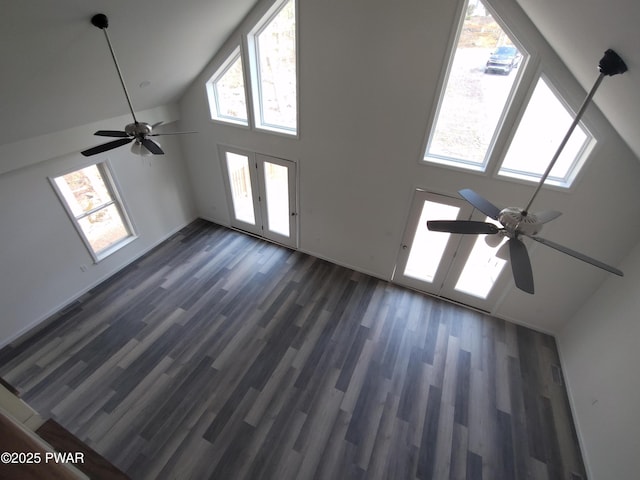 4409 Middleton Dr, Milford, PA 18337 - unfurnished living room with a ceiling fan, high vaulted ceiling, dark wood-style floors, french doors, and baseboards