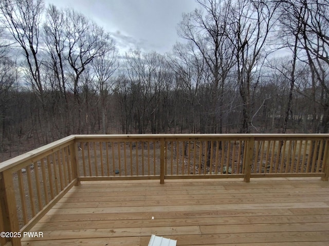 4409 Middleton Dr, Milford, PA 18337 - wooden terrace featuring a wooded view