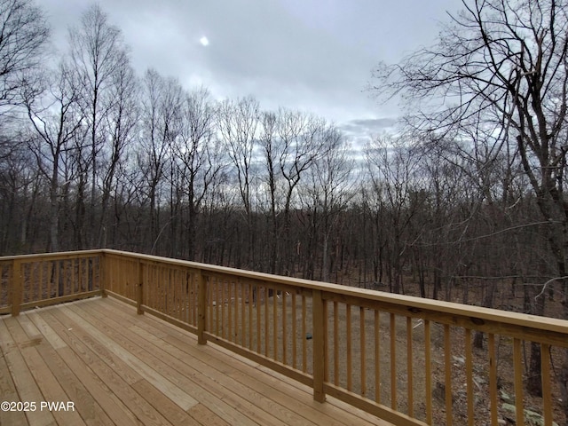 4409 Middleton Dr, Milford, PA 18337 - wooden terrace with a wooded view